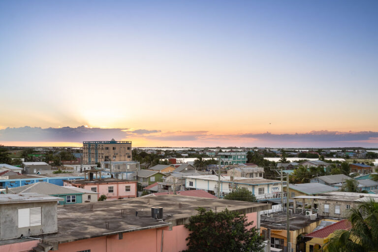 San Pedro, Belize: Sunset Over Ambergris Caye 1 Sunset over San Pedro, Ambergris Caye, Belize, a popular tourist destination known for its proximity to the Belize Barrier Reef.