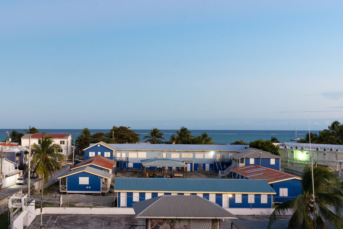 San Pedro Roman Catholic School on Ambergris Caye, Belize, provides primary and secondary education in Caribbean-style blue buildings.