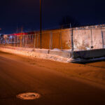 Minneapolis Police Fifth Precinct Police Station behind security fencing in January 2022.