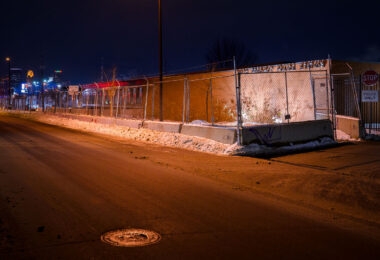 Minneapolis Police Fifth Precinct Police Station behind security fencing in January 2022.