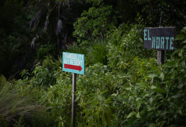 Signs for Tranquility Bay and El Norte on Ambergris Caye in Belize.