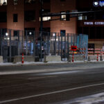Security around the Warren E. Burger Federal Building in downtown St. Paul the night before opening statements in the trial of the officers accused of violating George Floyd's civil rights. Located across the street from Twin Cities PBS.