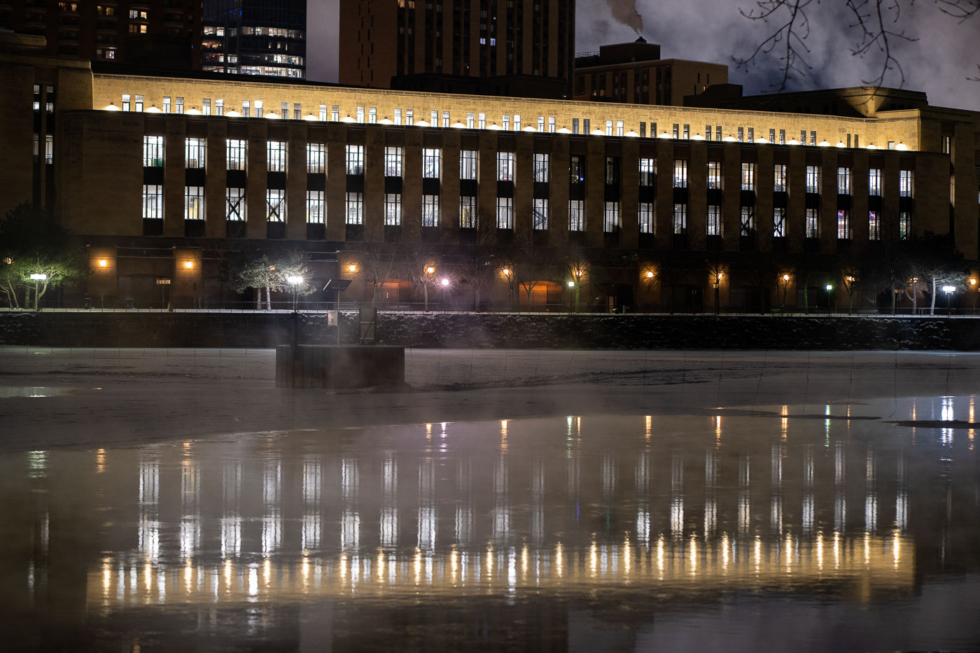 The downtown Minneapolis post office as seen from across the Mississippi River.