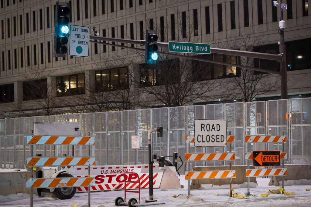 Security around the Warren E. Burger Federal Building in downtown St. Paul the night before opening statements in the trial of the officers accused of violating George Floyd's civil rights.