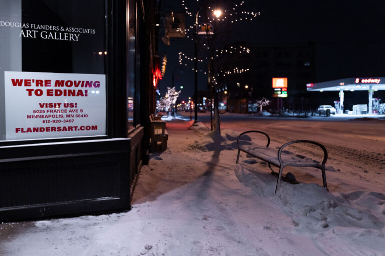 Flander's Art Gallery in Uptown Minneapolis 3 A sign in Flanders Art Gallery directing people to their other location in Minneapolis.