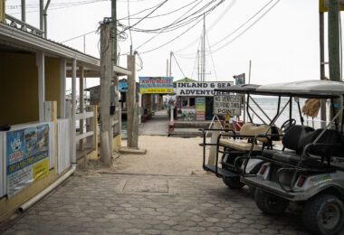 Golf Carts parked on Ambergris Caye in San Pedro Belize.