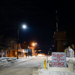 The fist at the intersection of 37th and Chicago in South Minneapolis. A sign that reads “You are now entering the free state of George Floyd”.