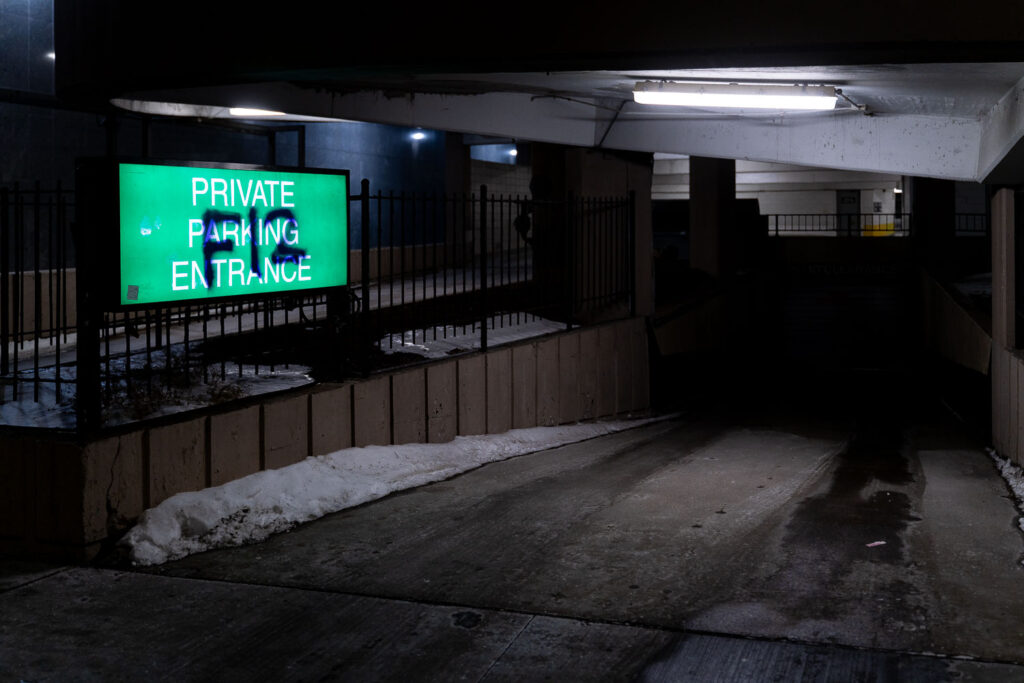 F12 on a parking garage sign in downtown Minneapolis.