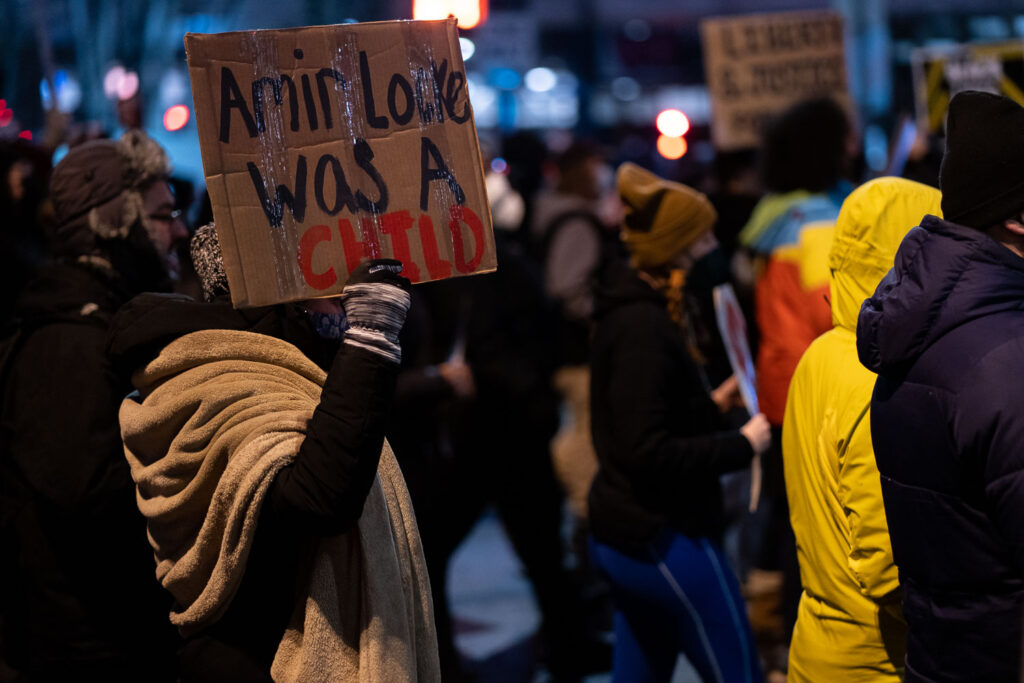 Protesters march through Downtown Minneapolis after demanding the Mayor resign following the Minneapolis Police shooting death of Amir Locke during a no-knock search warrant.
