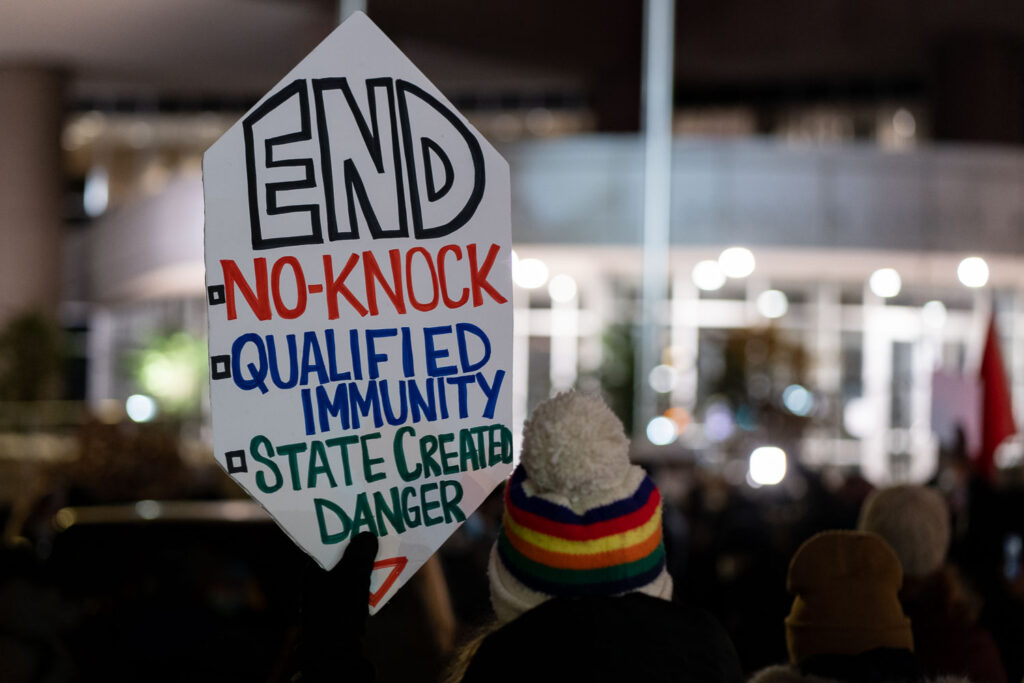 Protesters march through Downtown Minneapolis after demanding the Mayor resign following the Minneapolis Police shooting death of Amir Locke during a no-knock search warrant.