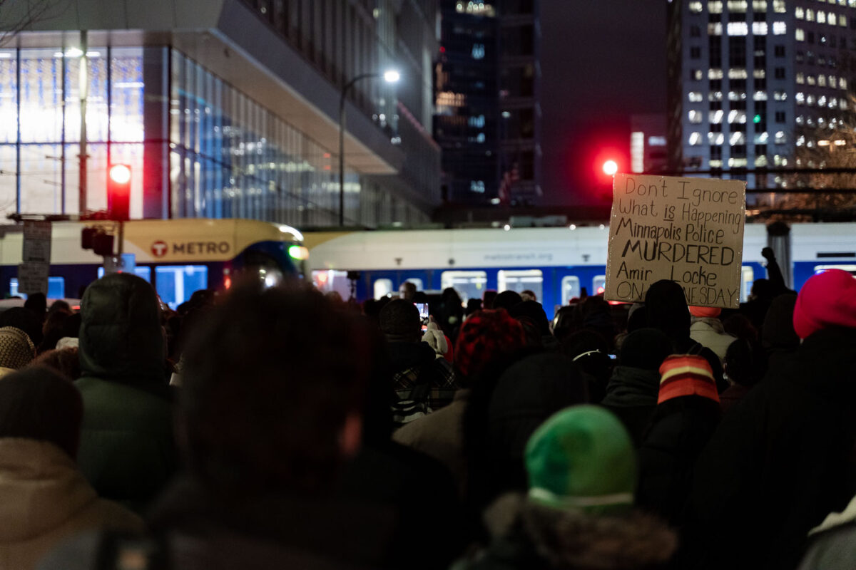 Protesters march through Downtown Minneapolis after demanding the Mayor resign following the Minneapolis Police shooting death of Amir Locke during a no-knock search warrant.