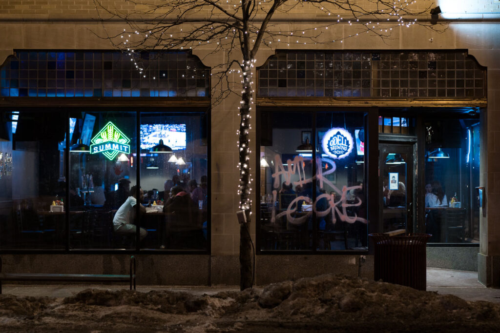 Graffiti left behind in protest following a march of about a hundred in South Minneapolis. Chants of "Say His Name! Amir Locke!" echoed through Uptown as they moved up and down Lake St.