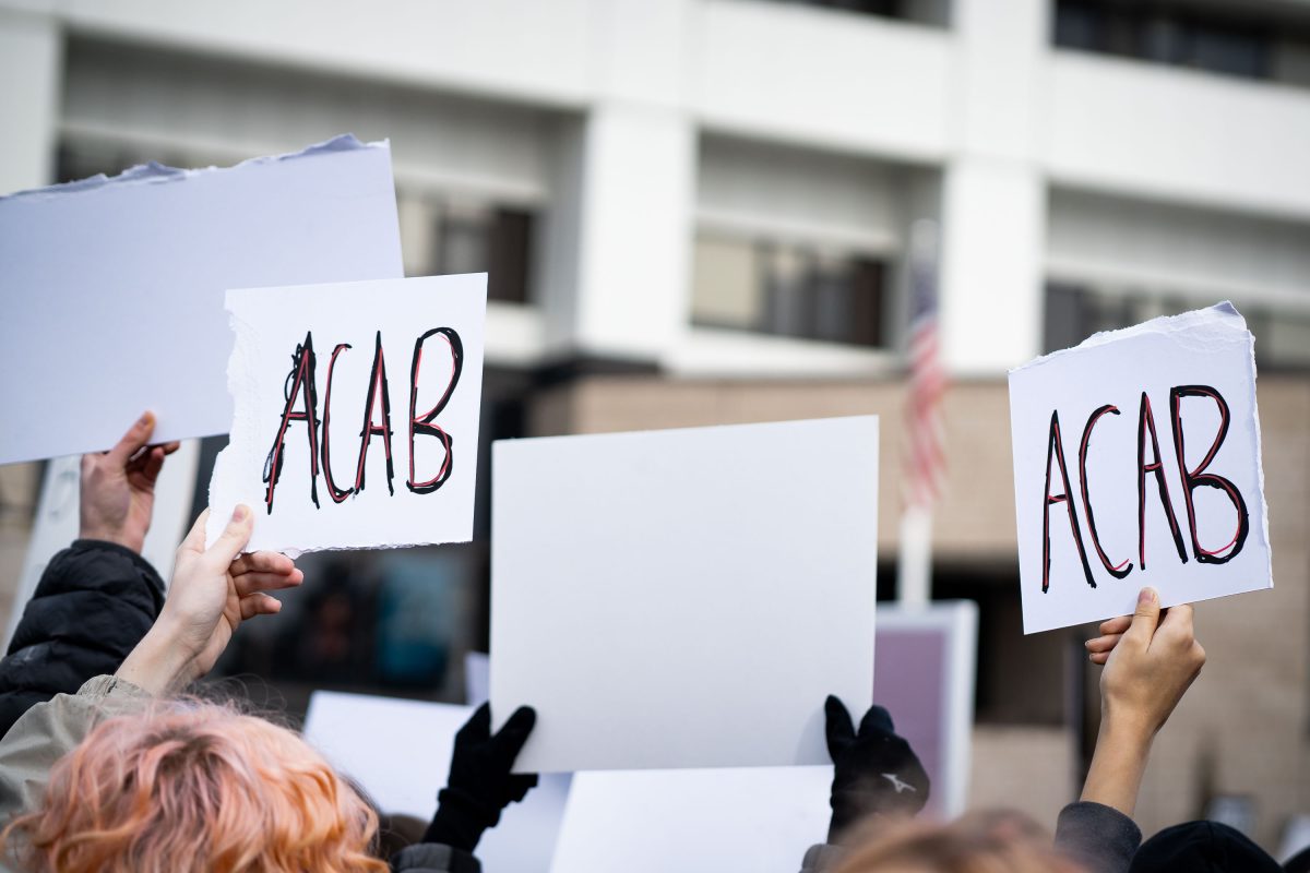 Amir Lock Student March, ACAB Protest Signs