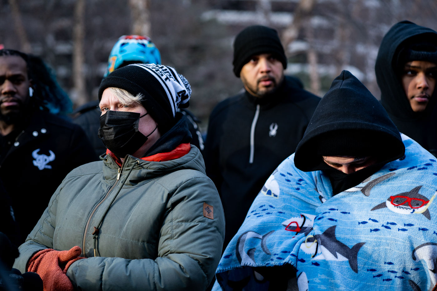 Daunte Wright's family and supporters gathered outside the Hennepin County Courthouse in Minneapolis following the sentencing of former Brooklyn Center police officer Kim Potter. Potter was convicted of first-degree manslaughter for the 2021 shooting death of Wright. The family expressed outrage at the sentence, with one member stating, “she’s gonna do a year and a half,” and calling the outcome “the epitome of corruption, the epitome of disrespect.” The Hennepin County Government Center, which houses the courthouse, serves as the primary judicial center for the county, a key governmental structure in the region.