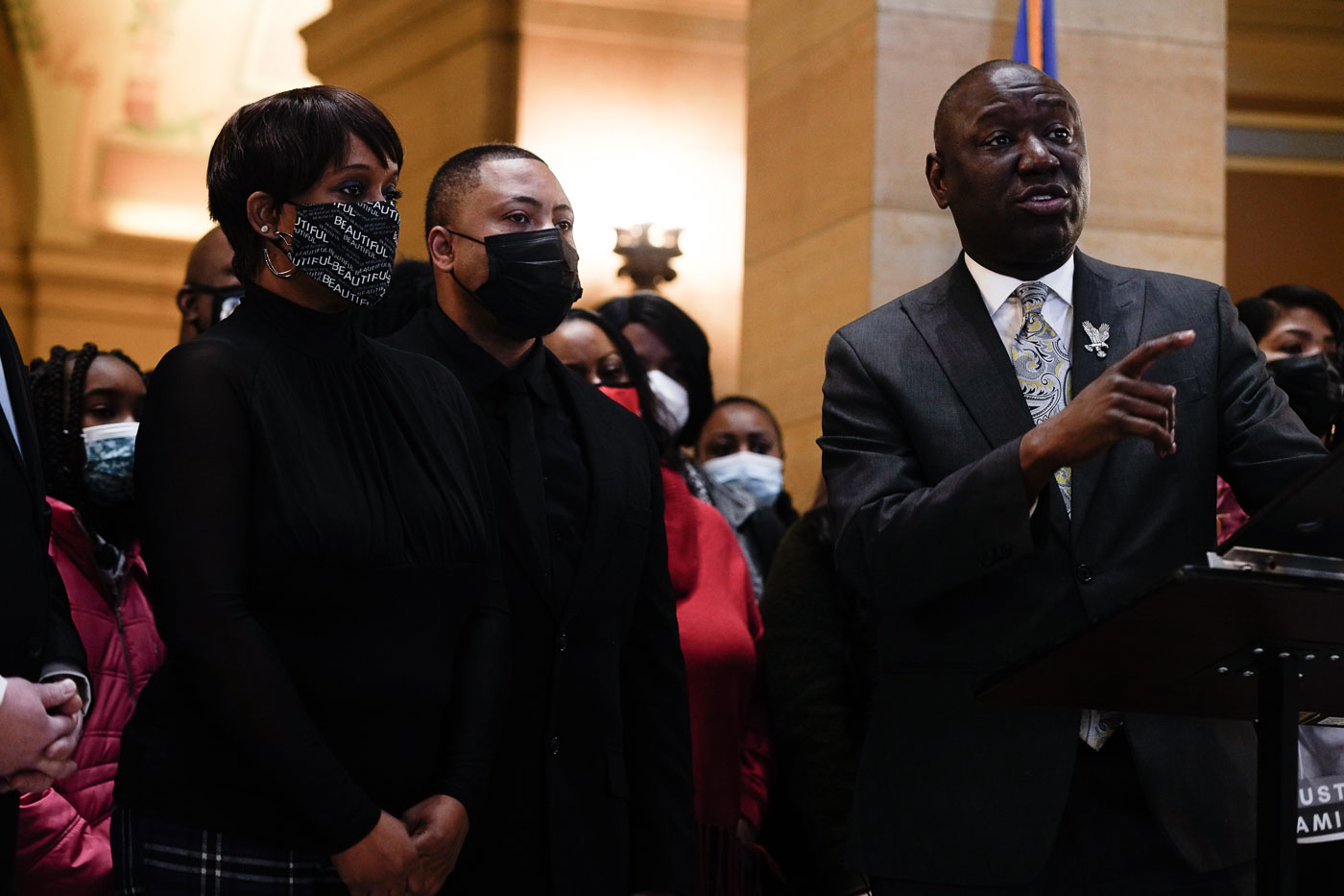 At the Minnesota State Capitol in St. Paul, families of victims of police violence, including Amir Locke, Jamar Clark, and Winston Smith, gathered to demand a ban on no-knock warrants. Locke's mother spoke at the podium, paying tribute to her son, who was killed on February 2, 2022. Civil rights attorney Ben Crump joined the families in their call for federal legislation prohibiting the use of these warrants.