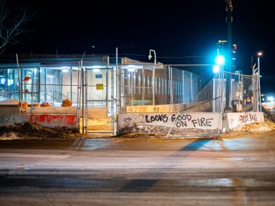 Minneapolis Fifth Precinct Construction Barrier Graffiti