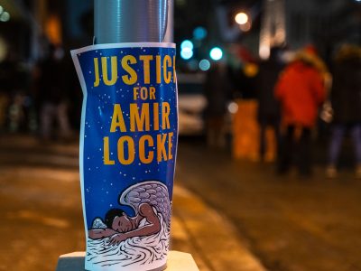 Justice For Amir Locke sign at the scene of his killing