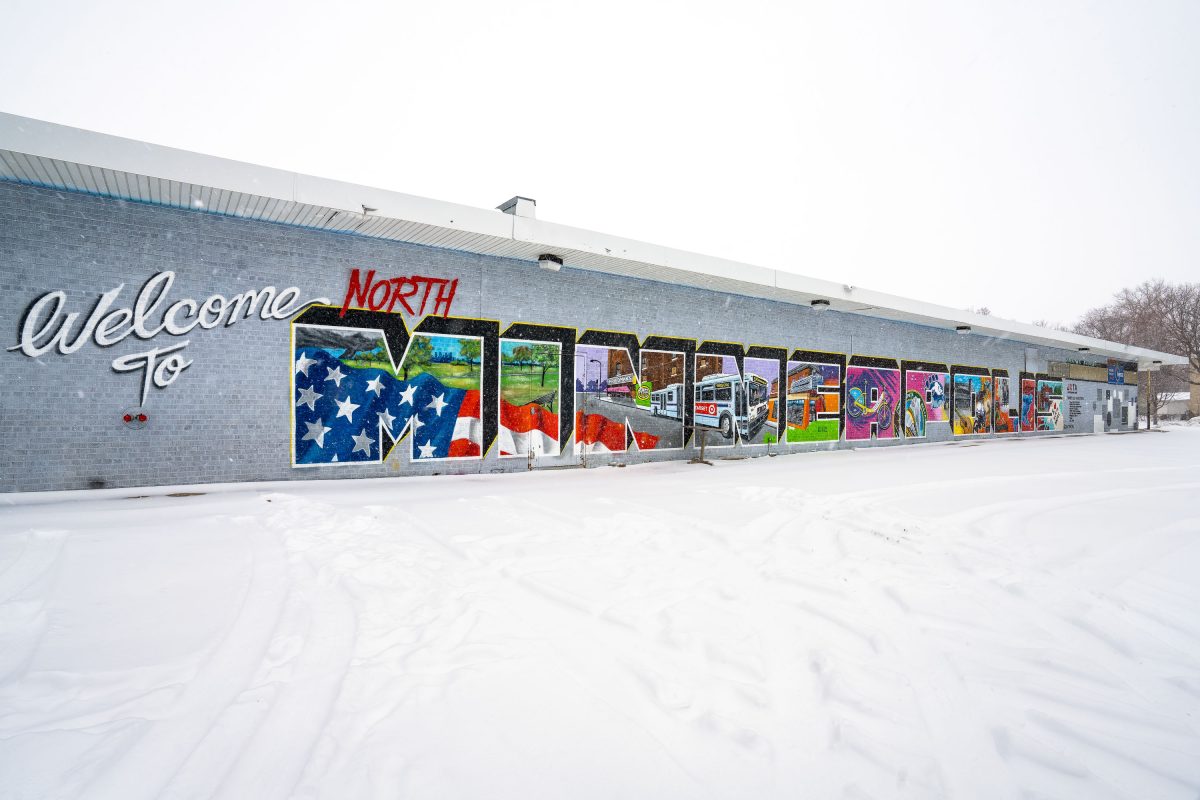 Large Welcome to North Minneapolis mural in the snow