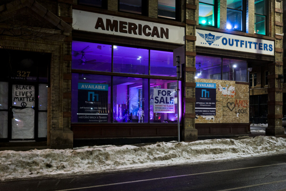 Minneapolis: American Outfitters boarded, “For Sale” sign, Amir Locke graffiti