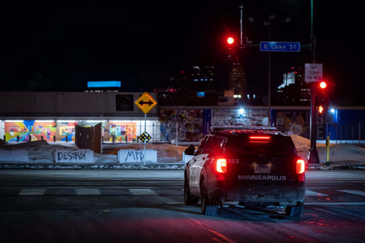 Minneapolis Police Car at E Lake St Amidst Protest Graffiti