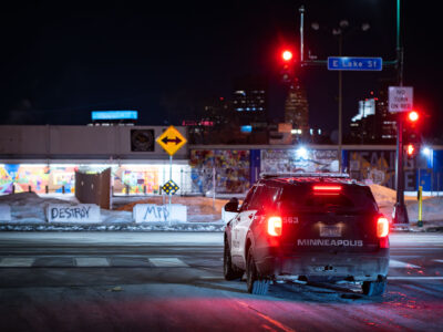 Minneapolis Police Car at E Lake St Amidst Protest Graffiti
