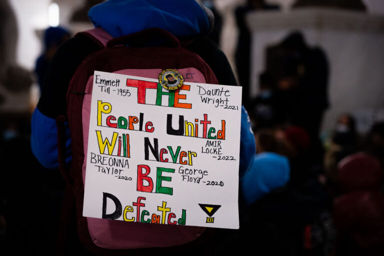 Minneapolis Students Protest for Justice at City Hall 1 Students gathered at Minneapolis City Hall to protest racial injustice and demand accountability for the death of Amir Locke. Organized by students from Minneapolis North High, the protest also honored victims of police violence, including Emmett Till, Breonna Taylor, George Floyd, Daunte Wright, and Jacob Blake. The sign "The People United Will Never Be Defeated" reflects a broader movement for civil rights and accountability, referencing historical struggles for justice.