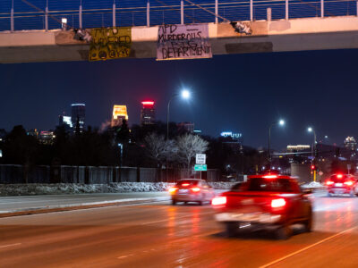 Minneapolis Protest Signs on Hiawatha Ave Overpass