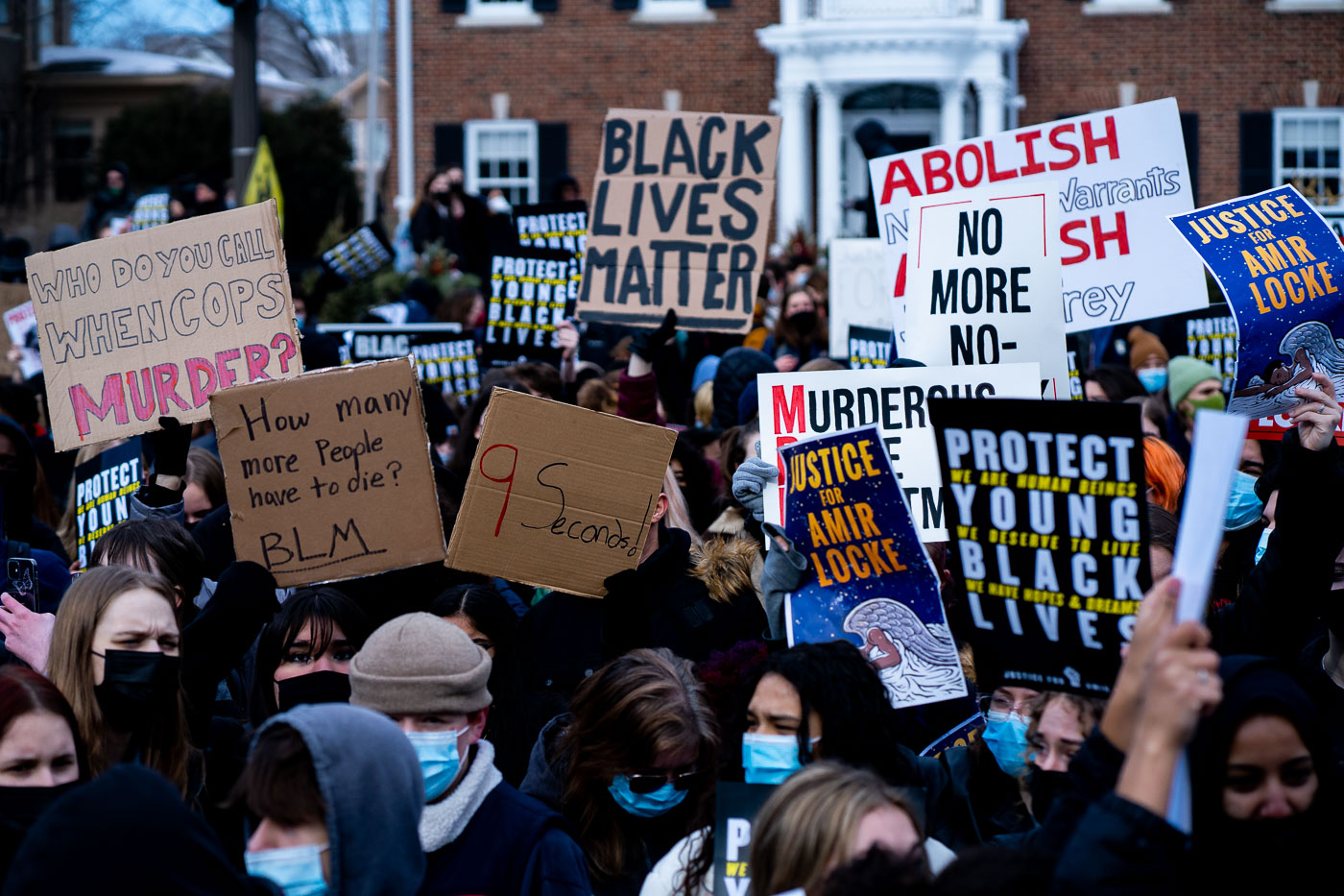 Protesters gathered outside the Minnesota Governor's Mansion in St. Paul to demand justice for Amir Locke, who was killed by Minneapolis police. The protest also called for the resignation of Minneapolis Police Chief Amelia Huffman and Mayor Jacob Frey. Signs displayed messages such as "Black Lives Matter," "Abolish No More Warrants," and "9 Seconds," referencing the circumstances of Locke's death. This event highlighted ongoing concerns about police conduct and racial justice in the Twin Cities.