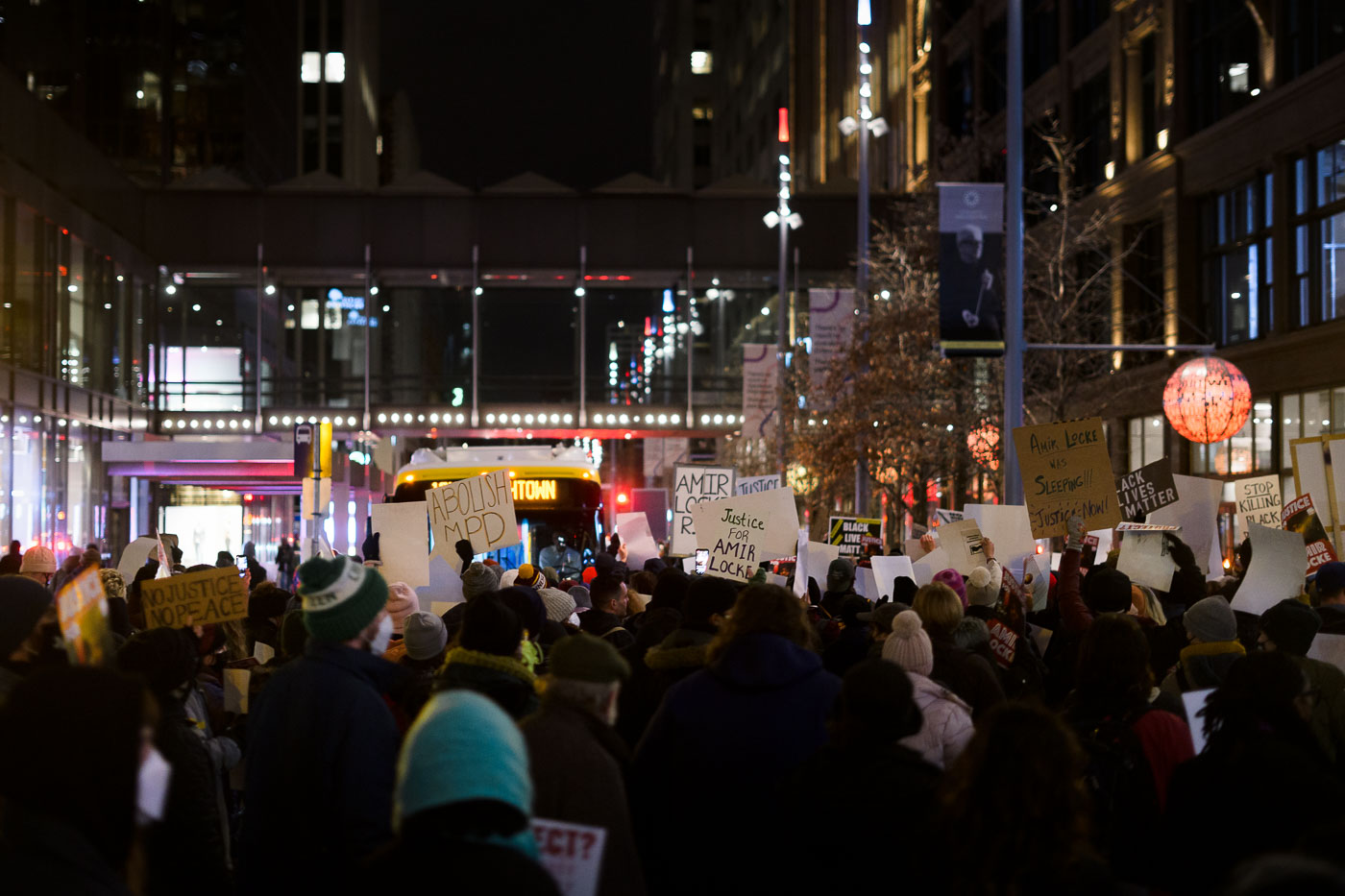 Protesters gathered in Downtown Minneapolis to demand justice for Amir Locke, who was killed by police during a no-knock warrant execution on February 2, 2022. The marchers carried signs with messages such as "Abolish MPD," "Justice for Amir Locke," and "Black Lives Matter." This event occurred in the wake of increased scrutiny of Minneapolis police practices following previous incidents, including the murder of George Floyd in 2020.