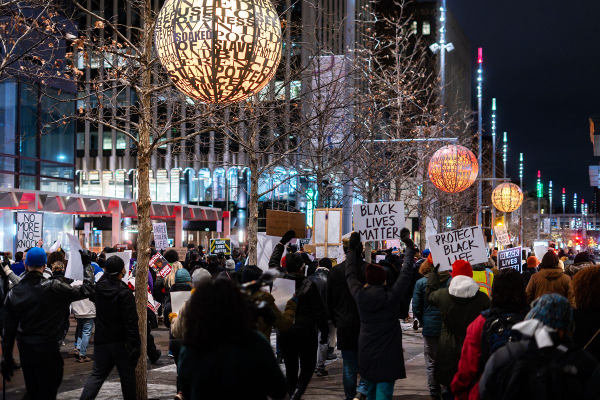 Protesters march on February 8, 2022 after Amir Locke is killed