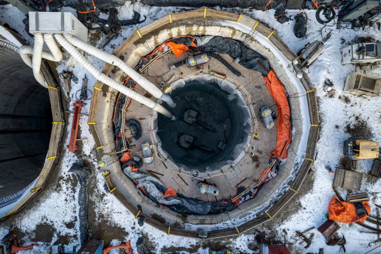 Ventilation Shaft, I-35W Stormwater Storage Facility, Minneapolis 3 Aerial view of circular concrete shaft during I-35W stormwater storage tunnel construction in snowy Minneapolis.