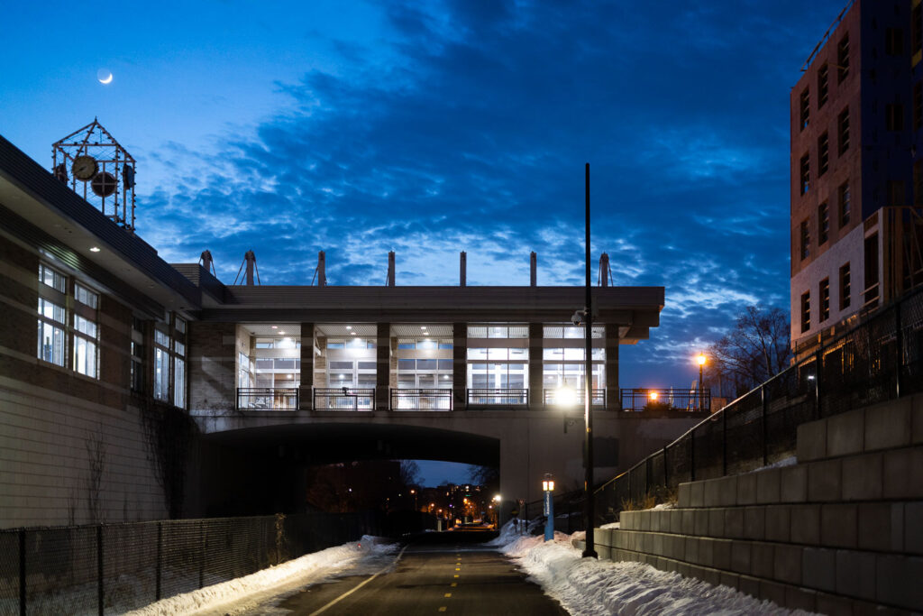 The Midtown Greenway in spring with building constrution on Hennepin Avenue.