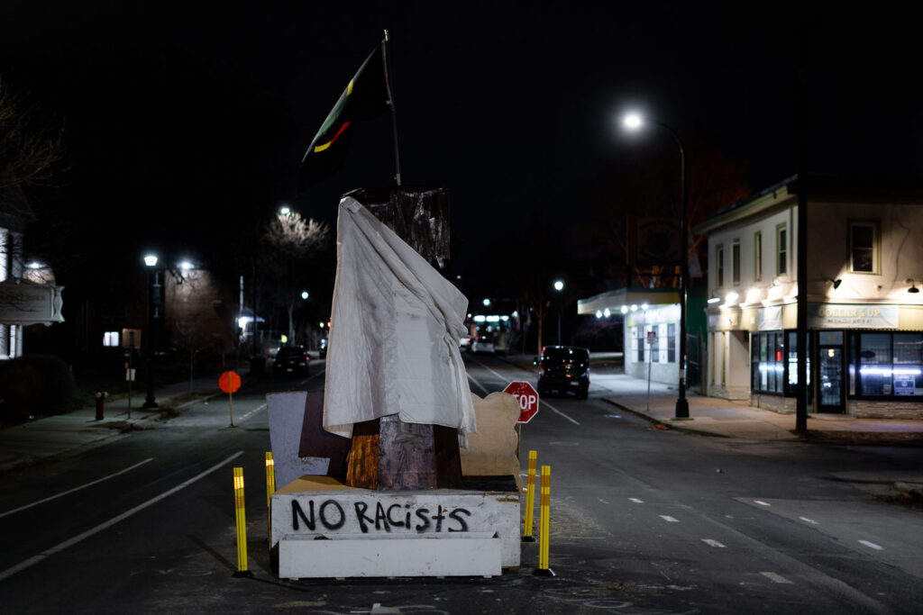 The "raised fist" sculpture wrapped in a blanket in memory of Amir Locke who was killed on February 2nd by Minneapolis Police during a search warrant.