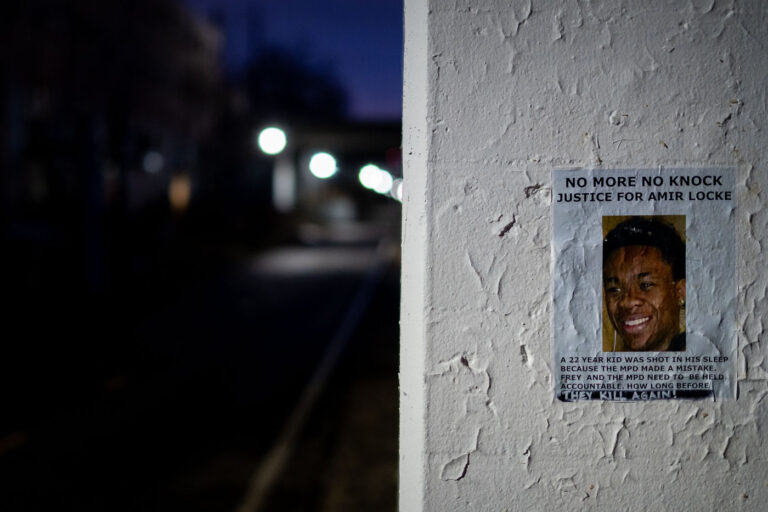 Amir Locke Justice Flyer on Midtown Greenway, Minneapolis 1 A flyer demanding justice for Amir Locke is affixed to a pillar along the Midtown Greenway in Minneapolis. Locke, a 22-year-old, was killed by Minneapolis police during a "no-knock" warrant execution in February 2022. The flyer calls for accountability for the police department and city officials, questioning the necessity of such raids. The Midtown Greenway is a popular multi-use trail built on a former railroad corridor, now a significant piece of urban infrastructure for recreation and transportation in the city.