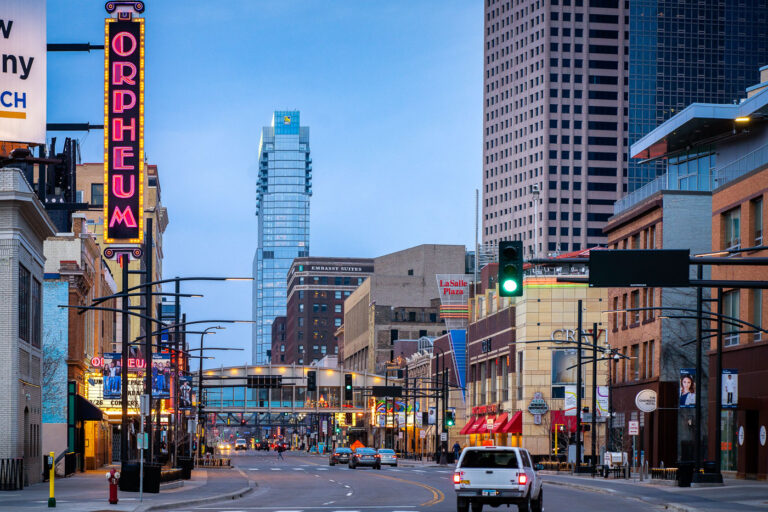 Gateway Tower and Orpheum Theatre, Downtown Minneapolis 1 The Orpheum Theatre, a historic Minneapolis venue opened in 1921, stands adjacent to the modern Gateway Tower in the city's central business district. The Orpheum has been a premier destination for Broadway shows and live performances following numerous renovations. Gateway Tower, also known as RBC Gateway, represents contemporary development in the urban core, which also includes the mixed-use LaSalle Plaza complex. This view highlights the juxtaposition of historic architecture and modern skyscrapers that define downtown Minneapolis.
