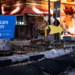 A sign placed by city regarding their "38th & Chicago Re-envisioned" plan. The city would hold community sessions to gather feedback in the days that followed.