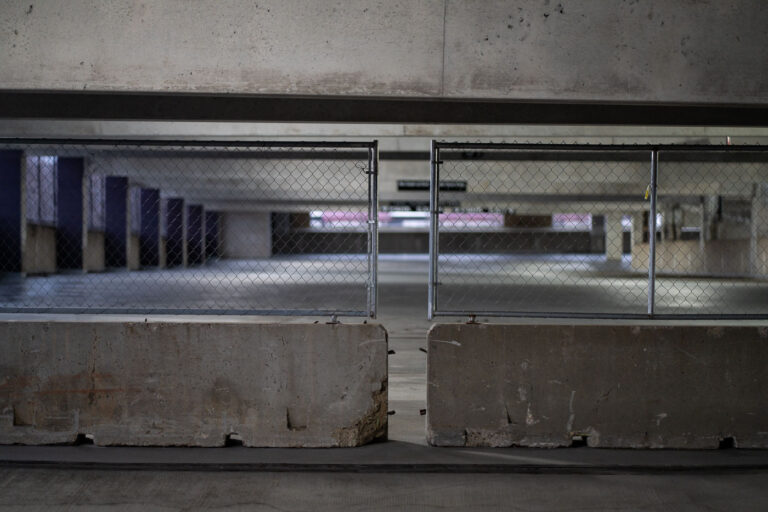 Barricades inside Seven Points parking ramp 1 The top floors of the Seven Points parking ramp continue to be closed off following June 2021 protests over the law enforcement shooting death of Winston Smith.