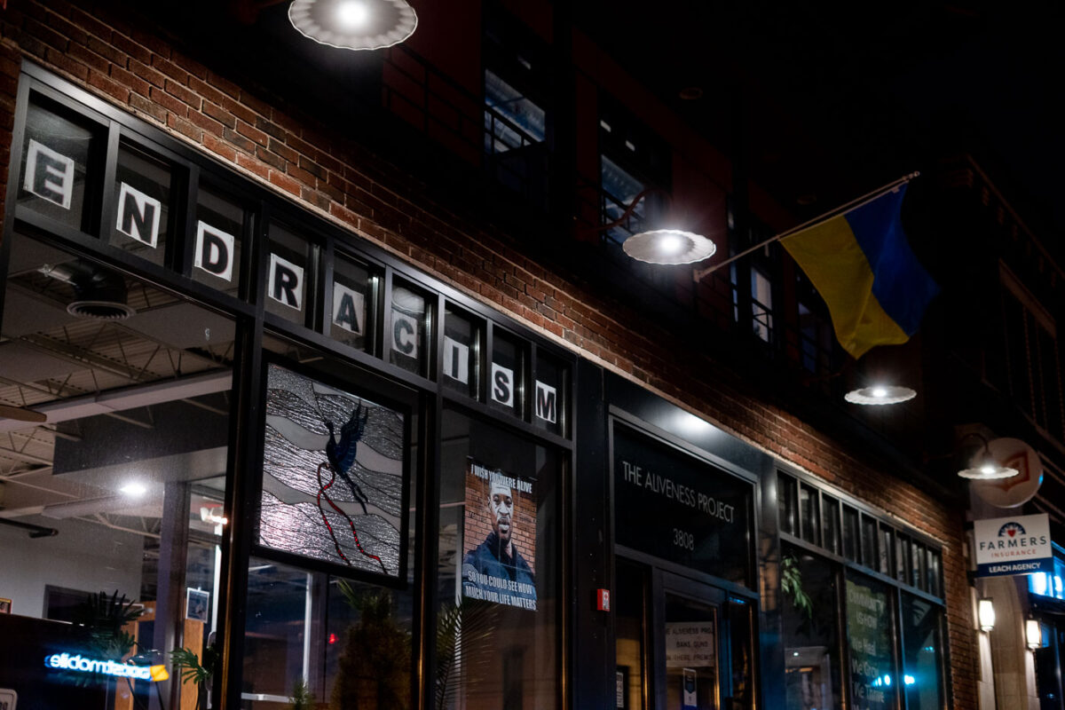 A storefront in South Minneapolis with "End Racism" in the window.