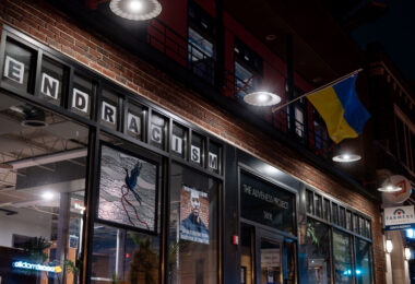 A storefront in South Minneapolis with "End Racism" in the window.