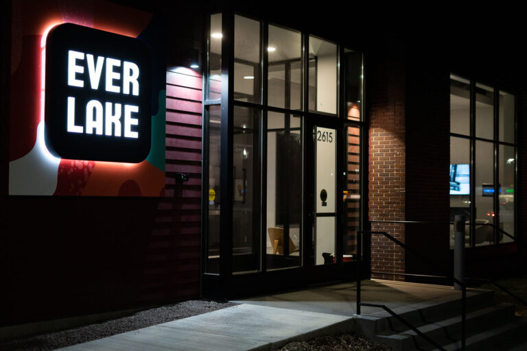 Everlake Apartments signage at night in April 2022 1 The Everlake apartment building. The then under construction building was burned down during unrest and has since been rebuilt and opened.