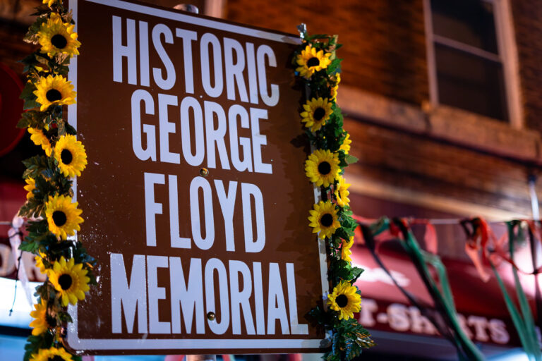 Historic George Floyd Square sign outside Cup Foods 2 A sign reading "Historic George Floyd Memorial" at George Floyd Square.