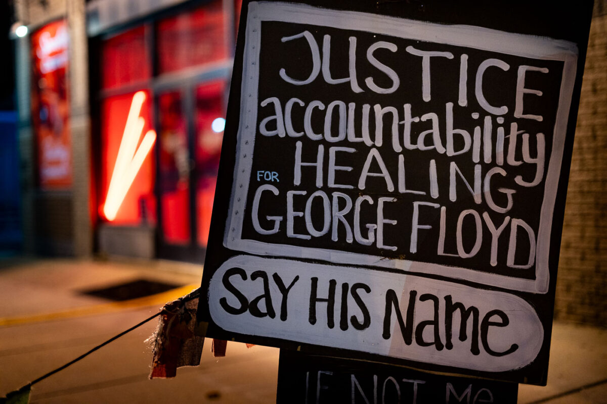 A protest sign reading "Justice accountability healing for George Floyd. Say His Name" seen at George Floyd Square in April, 2022.