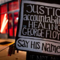 A protest sign reading "Justice accountability healing for George Floyd. Say His Name" seen at George Floyd Square in April, 2022.