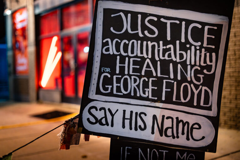 Justice Accountability Healing George Floyd Say His Name 2 A protest sign reading "Justice accountability healing for George Floyd. Say His Name" seen at George Floyd Square in April, 2022.