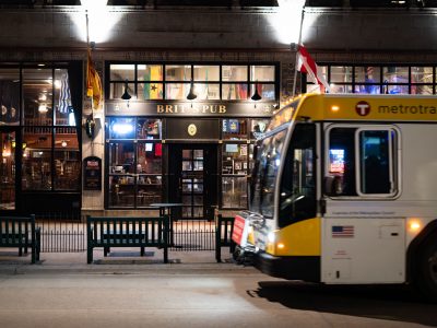 Metro Transit Bus Passes Brit's Pub on Nicollet Mall, Minneapolis