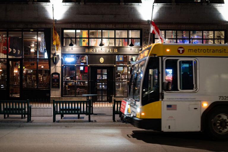 Metro Transit bus goes by Brit's Pub 1 Metro Transit bus outside of Brit's Pub on Nicollet Mall in downtown Minneapolis.
