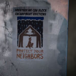 A flyer seen on a street sign that reads "Together we can block encampment evictions" "Protest your neighbors".