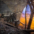 Stairs being removed near the Stone Arch Bridge.