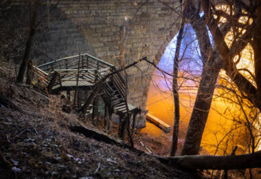 Stairs being removed near the Stone Arch Bridge.