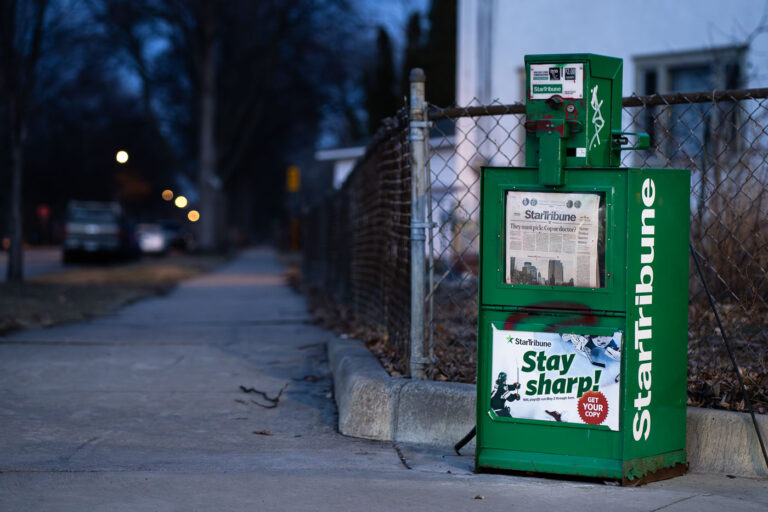 Star Tribune Newsrack in South Minneapolis 3 A news rack in South Minneapolis. Star Tribune headline "They must pick: Cop or doctor?"